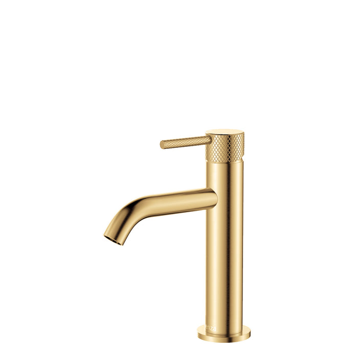 Gold faucet on a white background